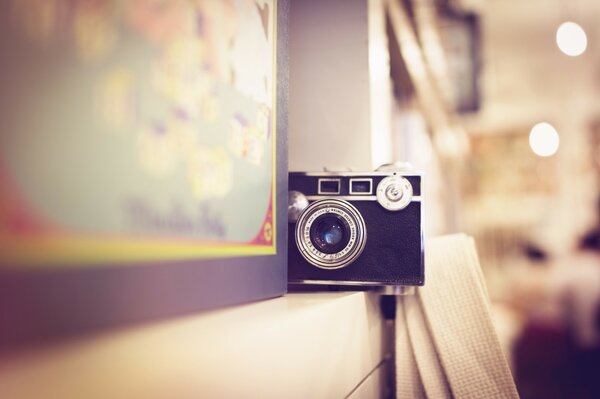 Vintage camera in a pastel interior