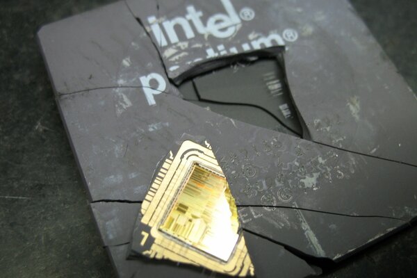 The yellow piece from the Intel processor is triangular