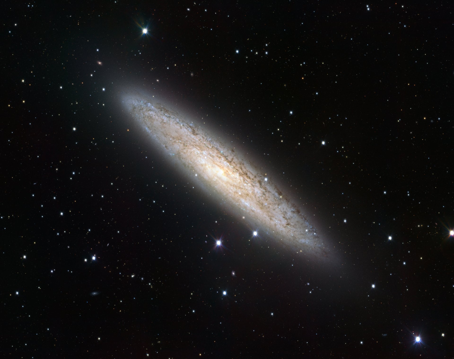 ngc 253 galaktyka konstelacja rzeźbiarz srebrna moneta