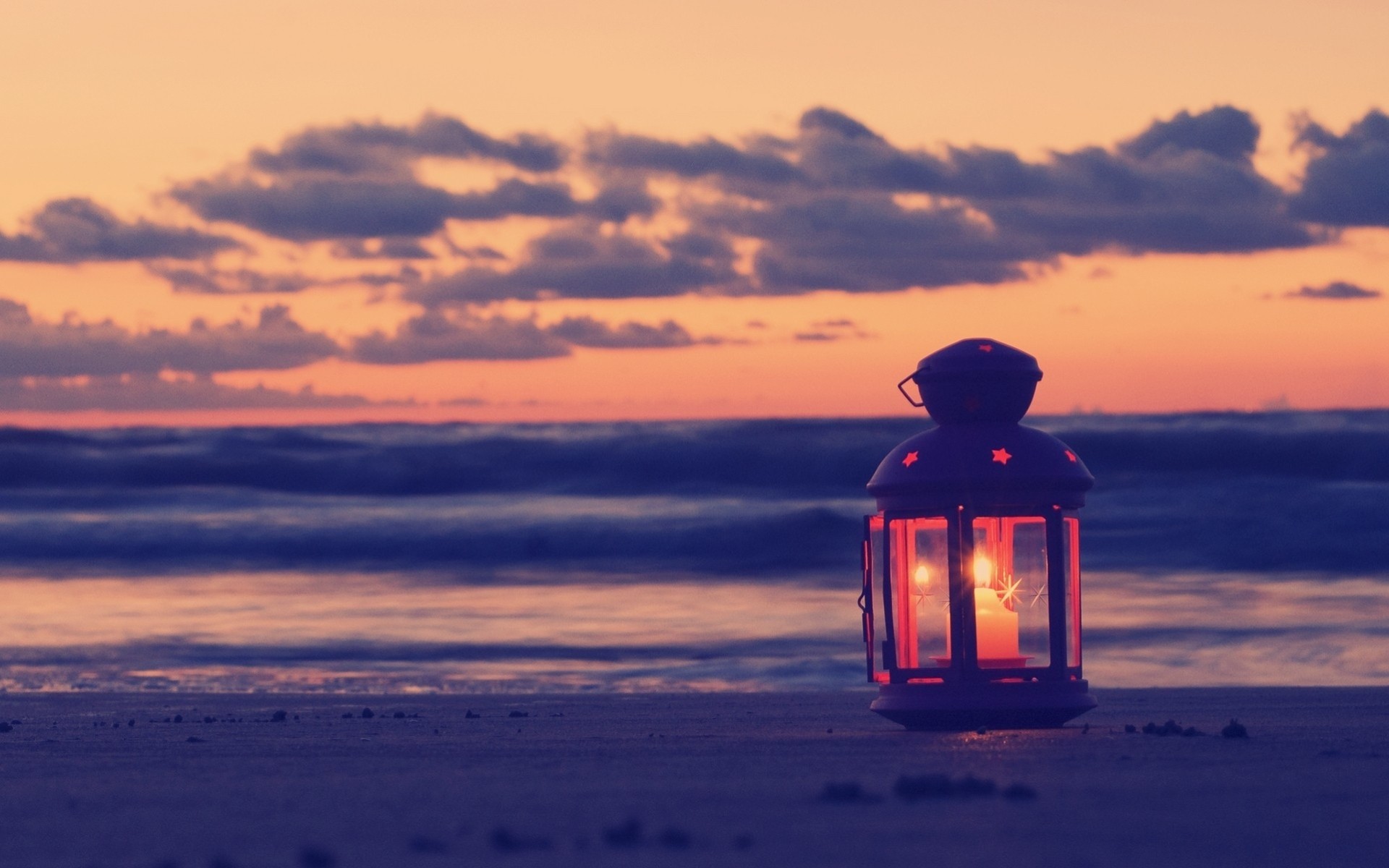 beach candle night clouds sea sand light