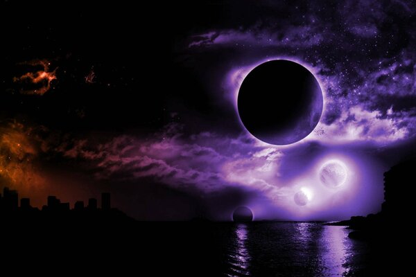 Planetas sobre el mar sobre un fondo oscuro