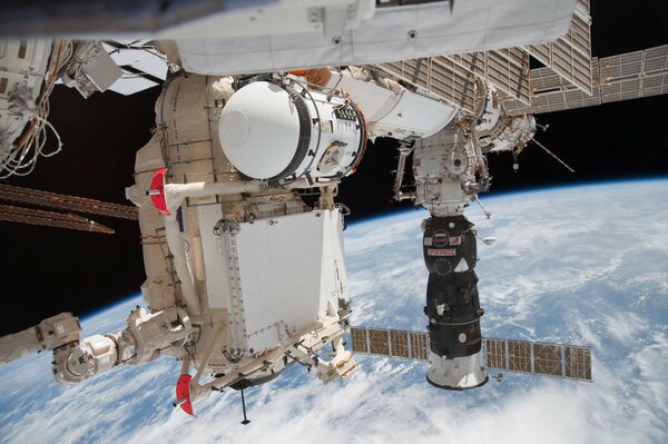 A spaceship above the earth in space