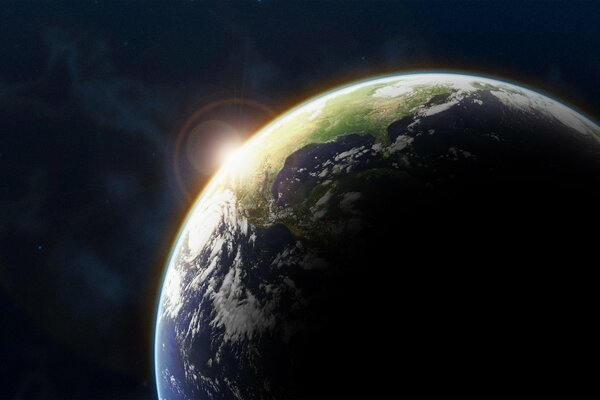 Amanecer sobre el planeta tierra