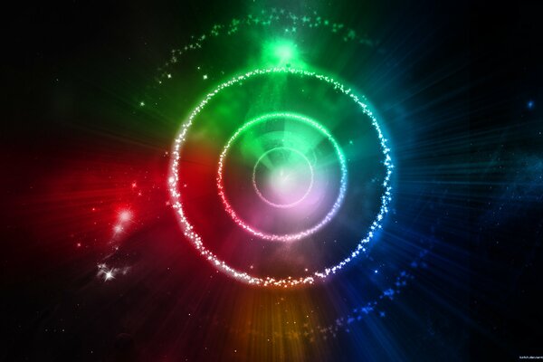 Cercles multicolores avec lueur dans l univers
