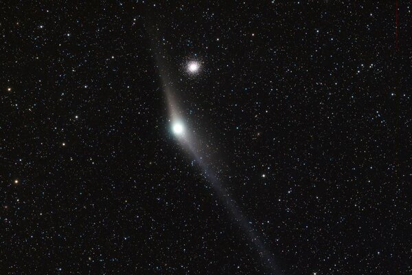 Comet Garradd passing by a globular star cluster