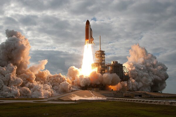 Launching a shuttle into a cloudy sky