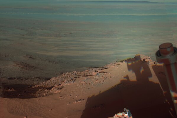 MARS AND THE ROVER IN A CRATER ON THE SURFACE