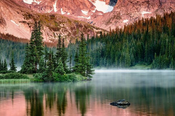 Lake at the foot of a beautiful mountain