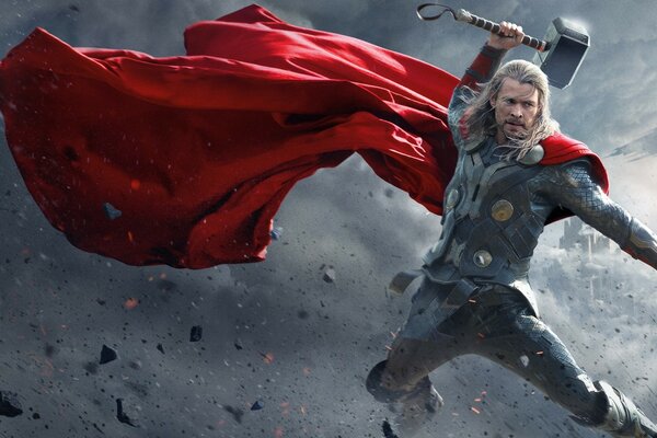 Thor con un martello in un mantello rosso della Marvel