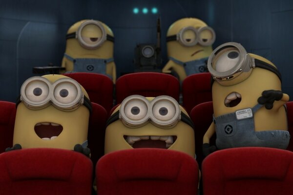 Minions au cinéma sur des fauteuils lumineux