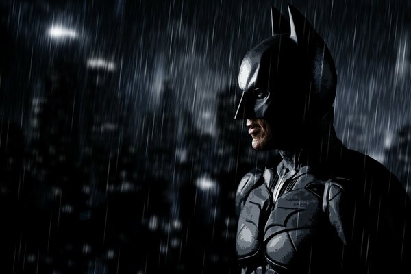 Batman in the rain in the dark