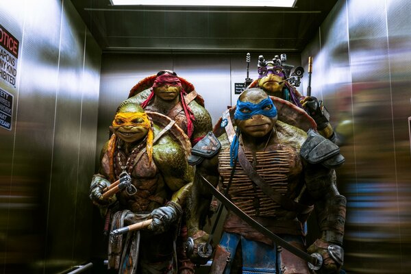 Teenage Mutant Ninja Turtles from the movie in the elevator