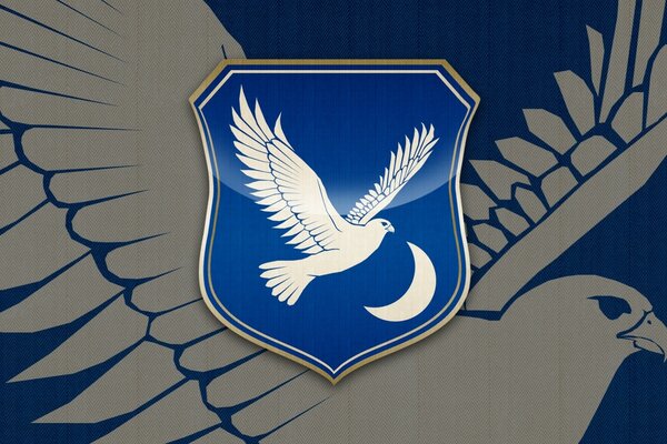 Blason bleu représentant un oiseau blanc et un mois