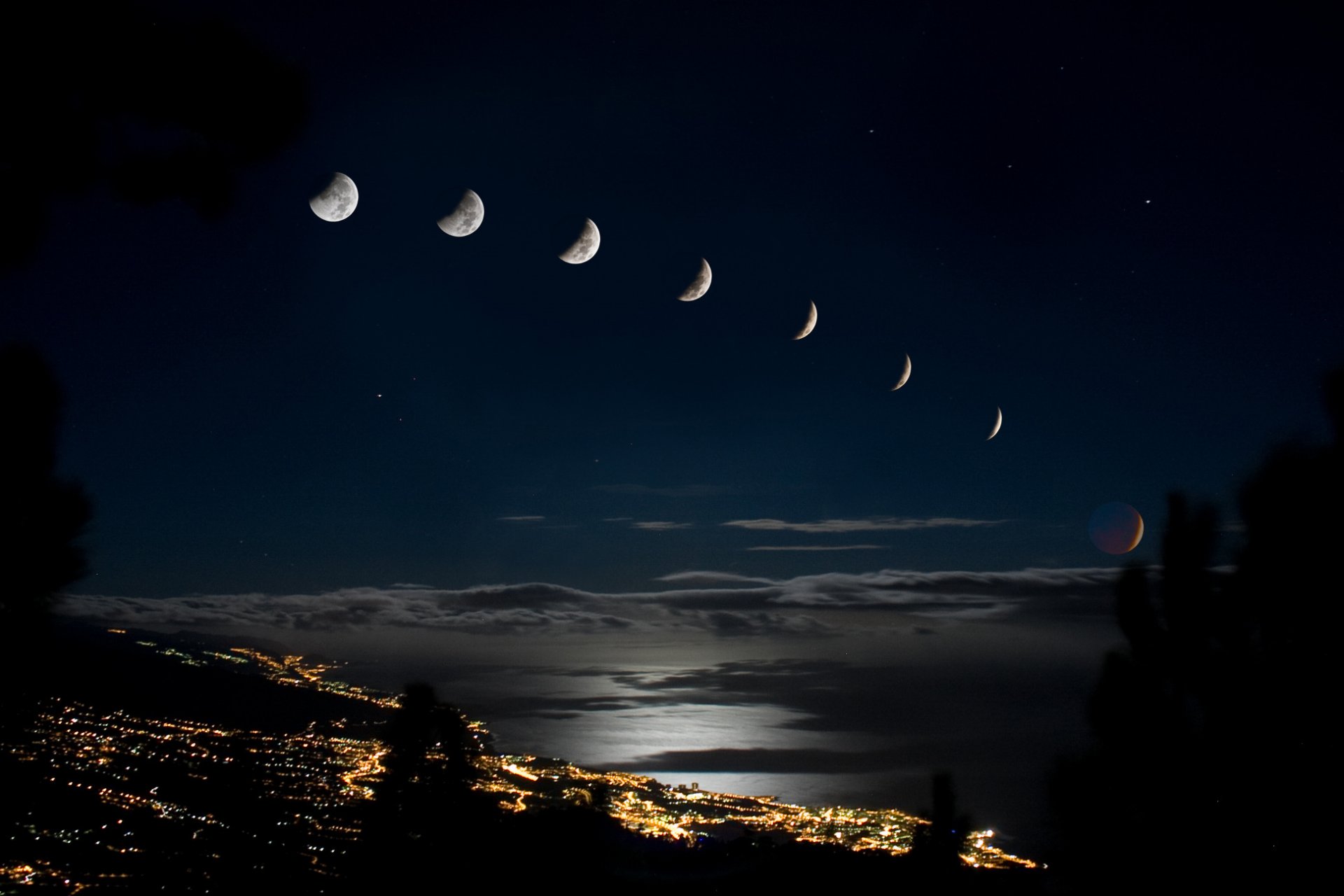 luna eclipse ciudad luces