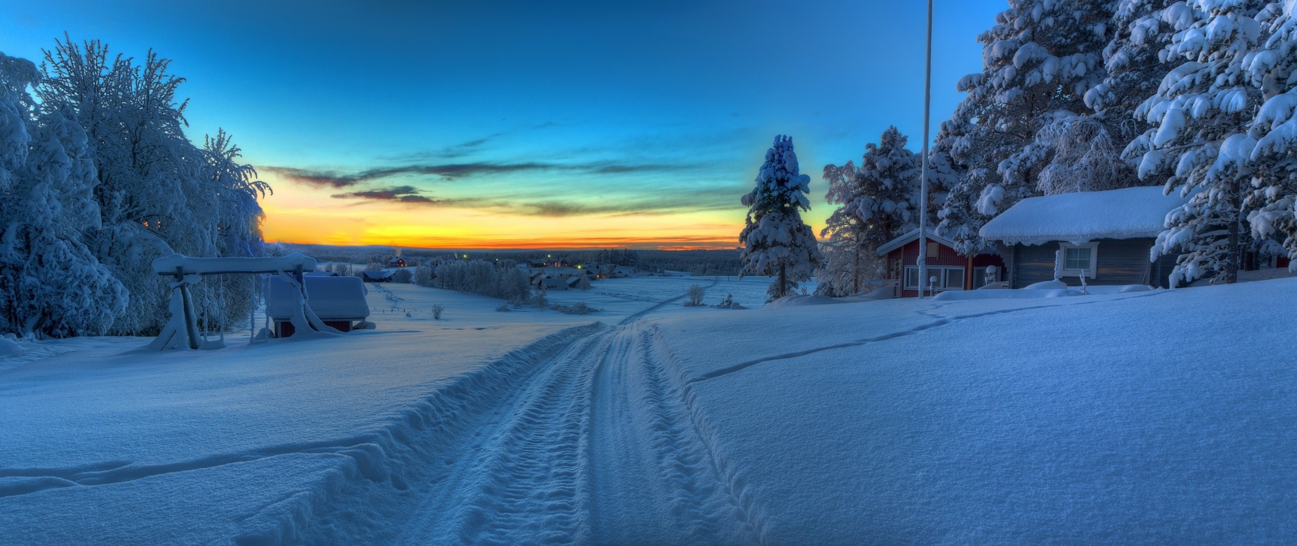 paesaggio tramonto strada panorama inverno svezia casa