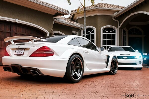 Mercedes Benz and Chevrolet Camaro