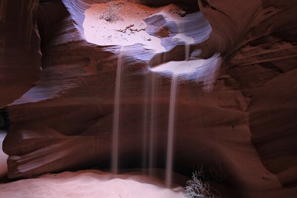 Sandy waterfall in Antelope Canyon