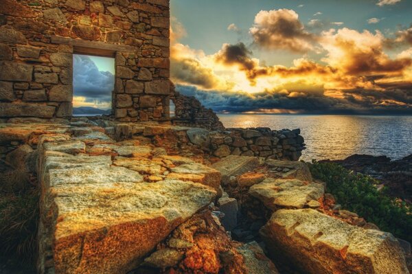 Castle ruins on the background of sunset