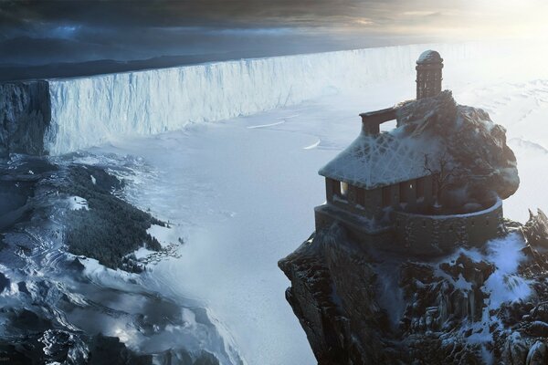 Casa en las rocas cubiertas de nieve arte