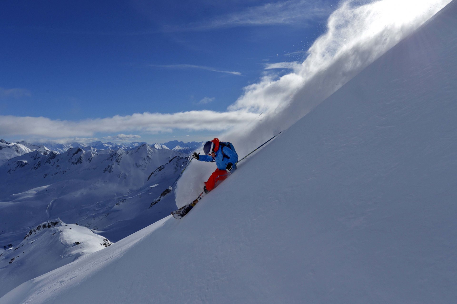 kiing skier mountain snow winter clouds sky