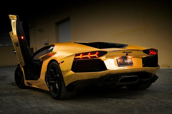 The door is like the wing of a golden Lamborghini