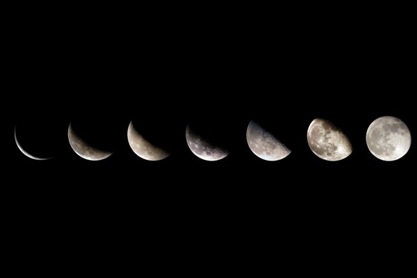 Phases of the moon s growth from new moon to full moon on a black background