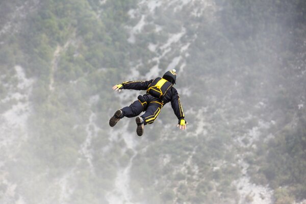 Parachute jump in flight at altitude