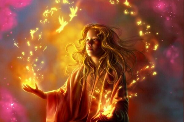 A girl with flowing hair juggles fire