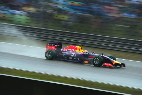 Racing car in motion on the ring road