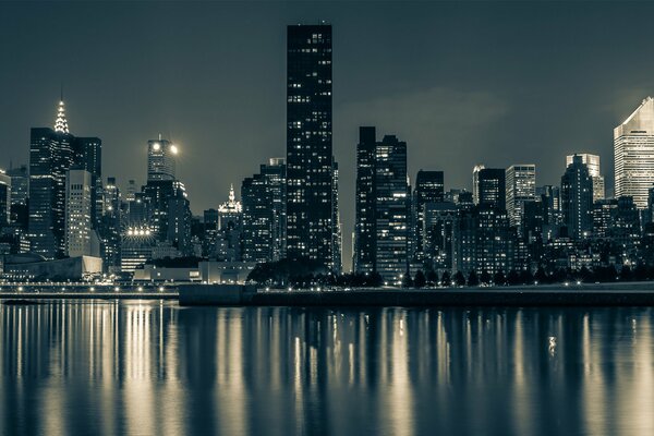 Reflection of the night city in the water