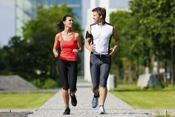 A man and a woman are running together