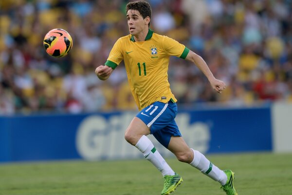 A football player runs at a match