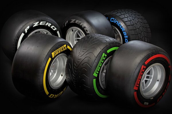 Different types of tires on a black background