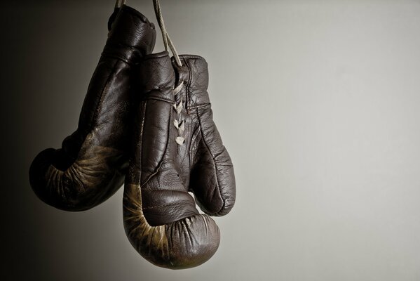 Boxing gloves on a smooth background