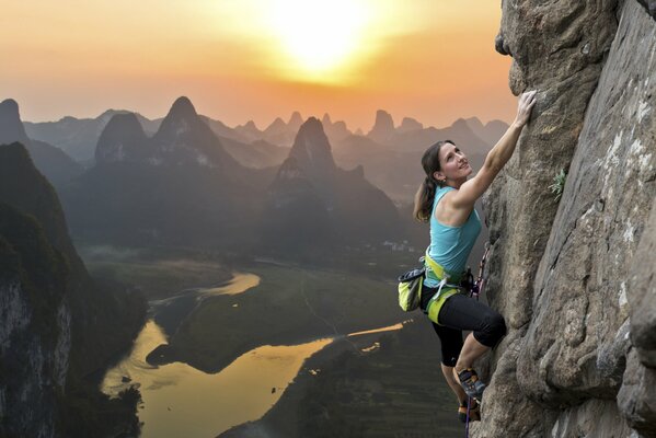 Climbing a mountain with a girl