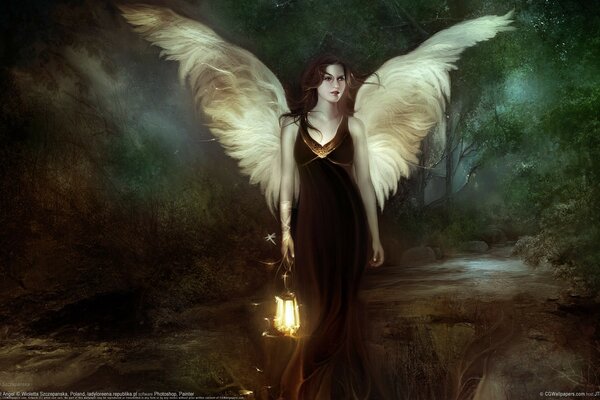 A girl with angel wings with a flashlight