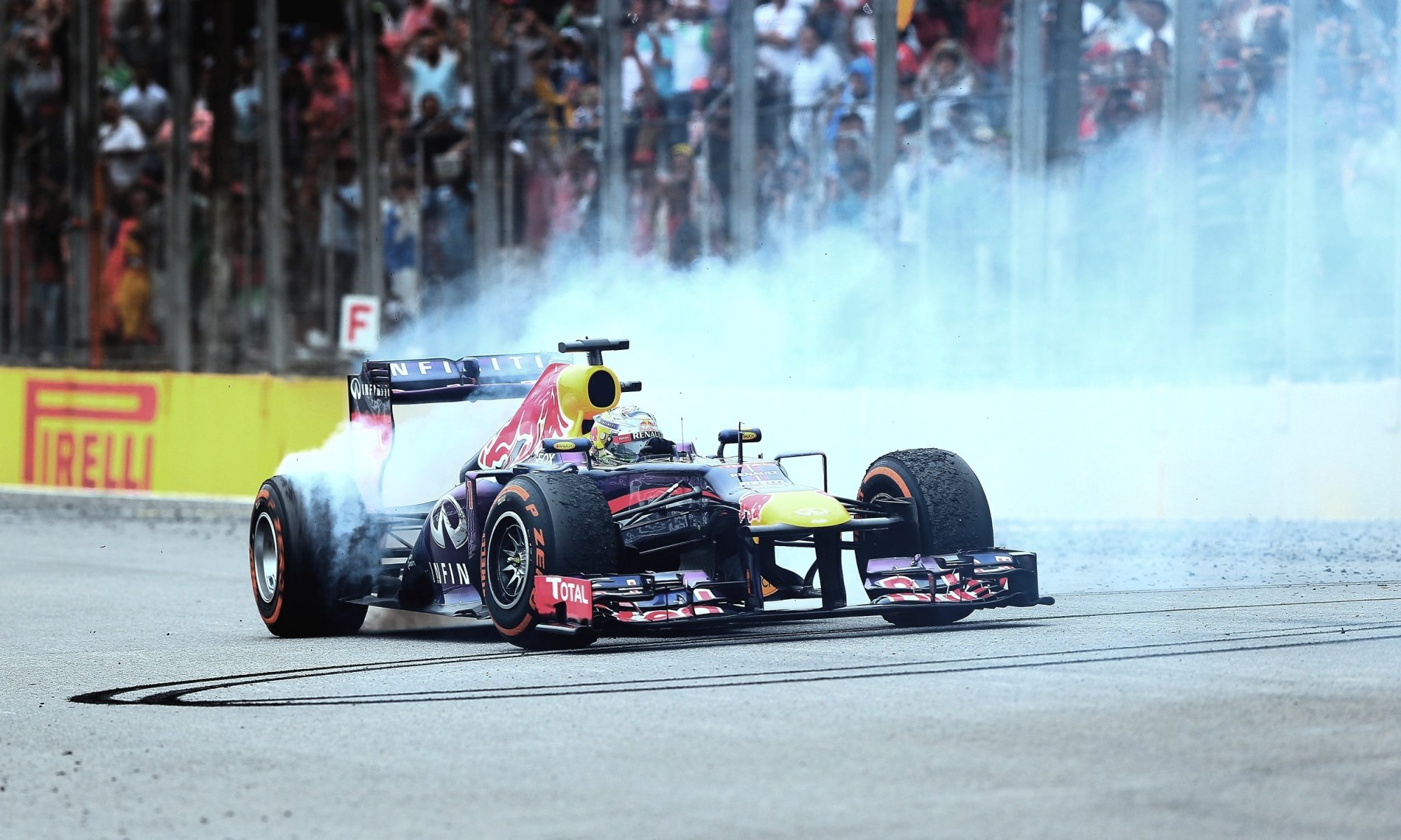 vettel f1 red bull brazil interlagos champion donut smoke formula 1