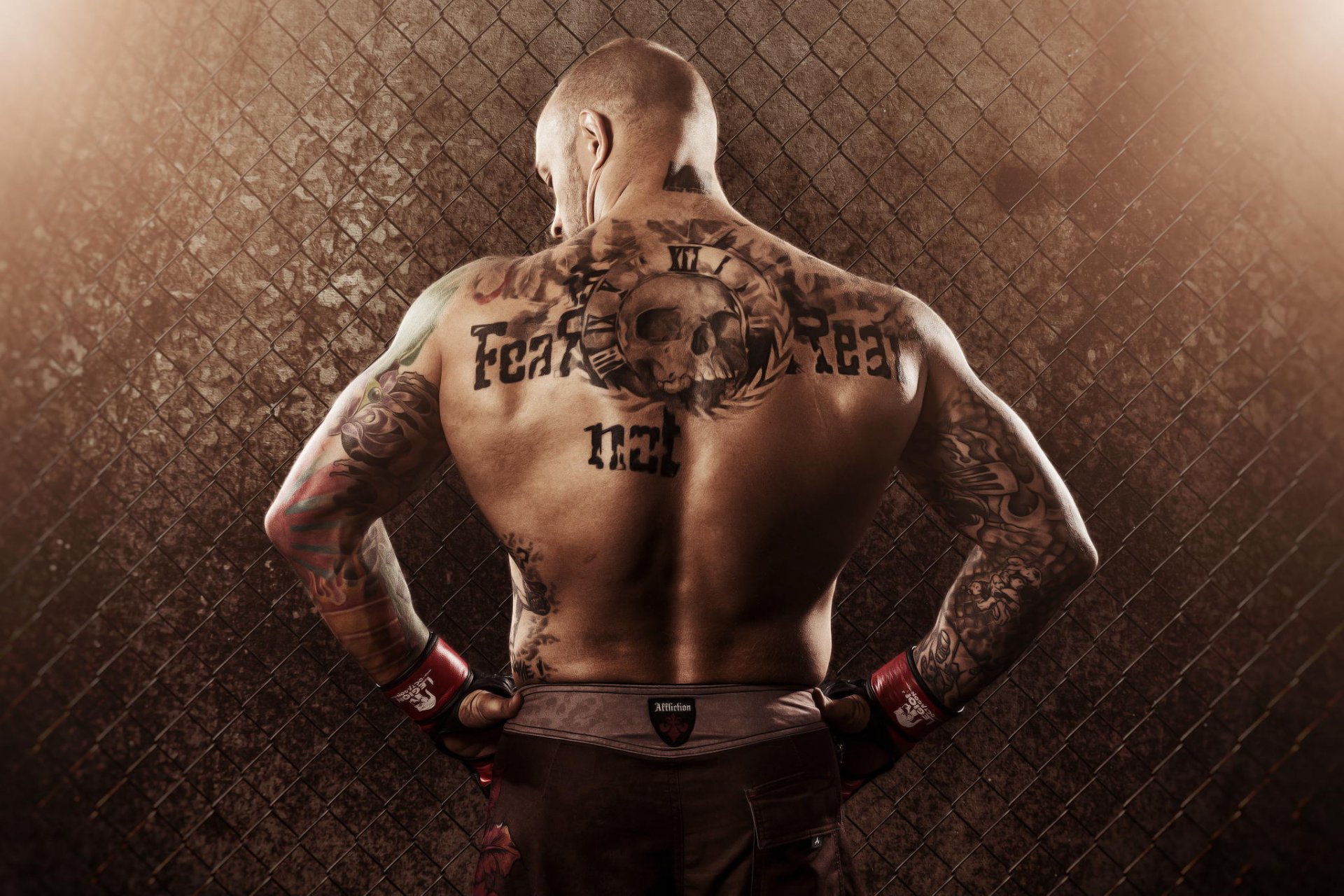 mixed martial arts male wrestler back tattoos mesh