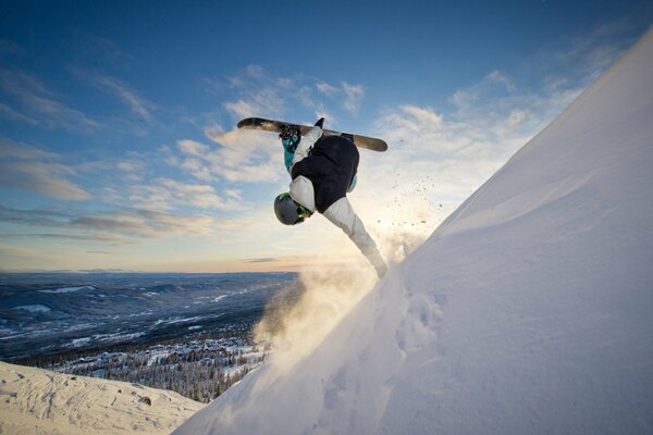 Beautiful photo of a snowboarder coming down the mountain