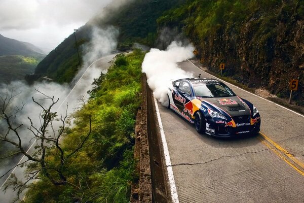 Sports car on the highway in the mountains