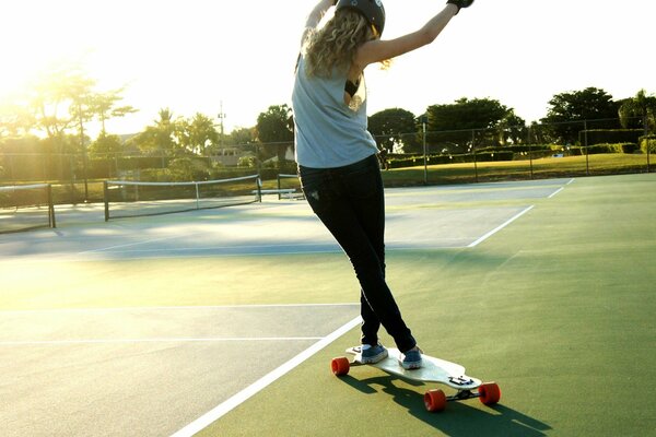 Girl sports skate board