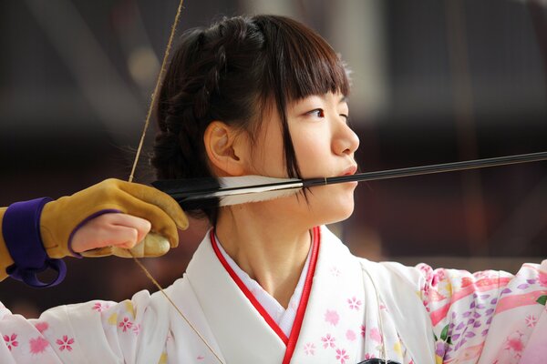 Japanese archer takes aim at the target