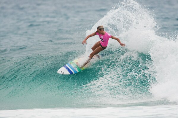 A second before the girl falls from the board