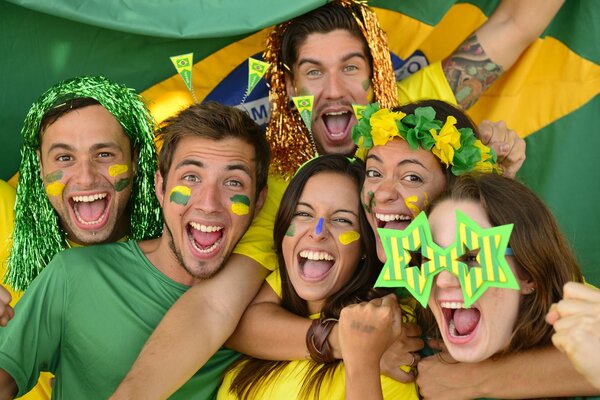 Brazilian football fans with painted faces