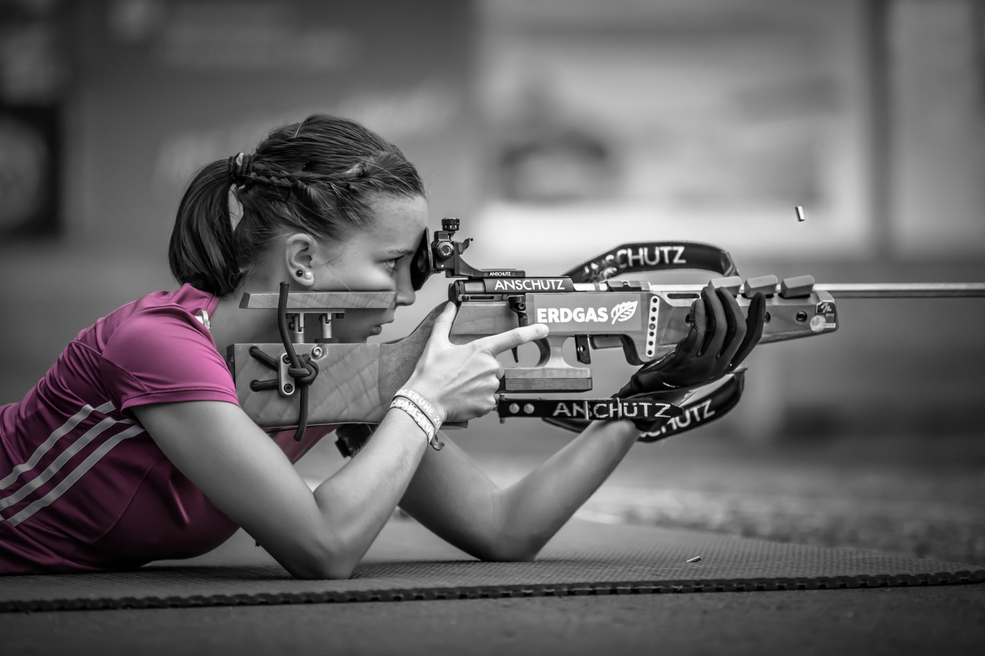 pink sniper shooting girl bokeh