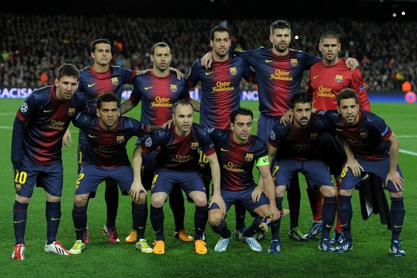 Foto del equipo de fútbol en el estadio