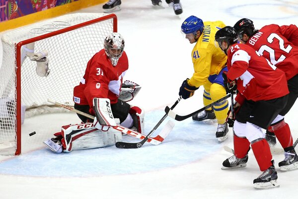 Jugadores de hockey sobre hielo, juegos Olímpicos