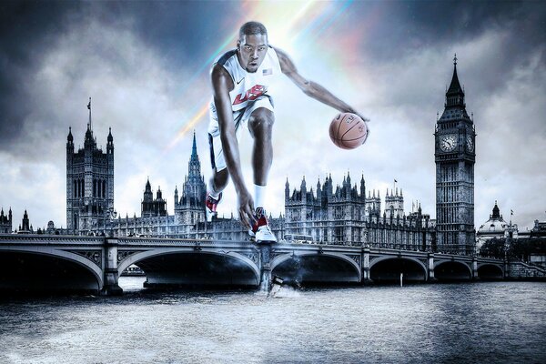 Basketball player with a ball on a London photo