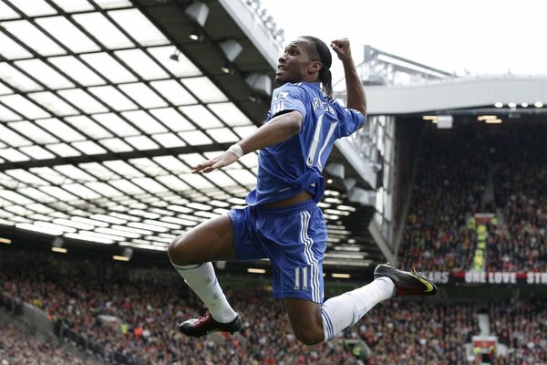 Didier Drogba celebrates his victory and his goal