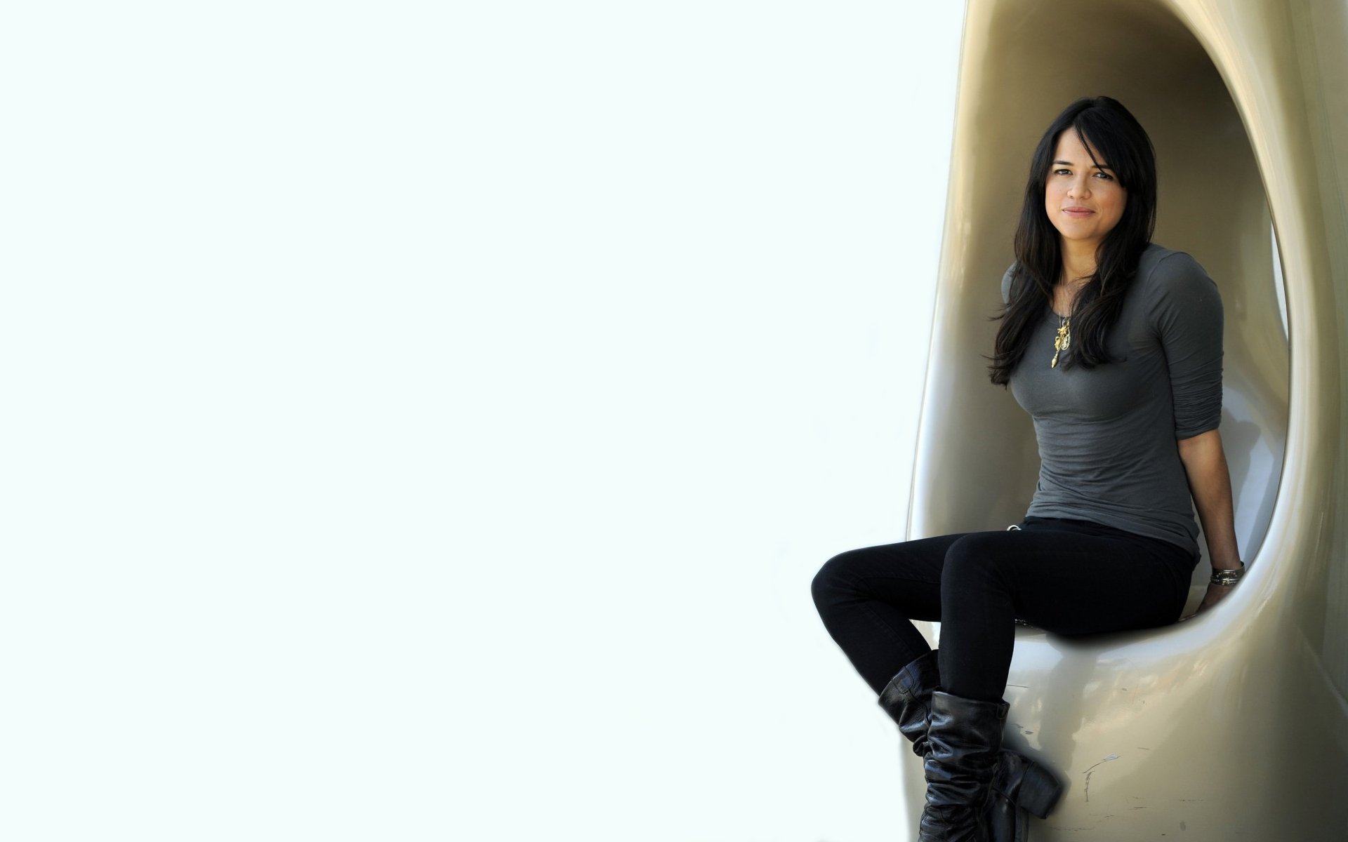 michelle rodriguez sitting boots jean